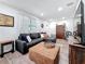 Comfortable living area with a sectional sofa, area rug, and modern furnishings at 4339 58 N Ave, St Petersburg, FL 33714