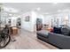 Open floorplan featuring a modern living area seamlessly connected to the kitchen and dining space at 4339 58 N Ave, St Petersburg, FL 33714