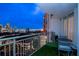 Relax on this home's private balcony with synthetic grass and views of the city skyline at 450 Knights Run Ave # 1003, Tampa, FL 33602