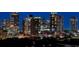 View of the cityscape at twilight, showcasing the vibrant city lights and modern architecture at 450 Knights Run Ave # 1003, Tampa, FL 33602
