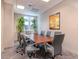 Spacious conference room with natural light and modern decor at 450 Knights Run Ave # 1003, Tampa, FL 33602