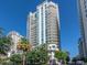 Stunning high-rise condominium with multiple balconies and lush tropical landscaping at 450 Knights Run Ave # 1003, Tampa, FL 33602