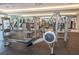 Fitness center with rowing machine and weight machines at 450 Knights Run Ave # 1003, Tampa, FL 33602