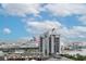 The city view showcases a cruise ship and downtown buildings under a bright blue sky at 450 Knights Run Ave # 1003, Tampa, FL 33602