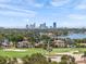Stunning aerial view of the city skyline and homes bordering the golf course and waterways at 454 35Th Ne Ave, St Petersburg, FL 33704