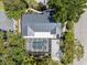 Overhead aerial view of screened-in pool and manicured landscaping at 454 35Th Ne Ave, St Petersburg, FL 33704