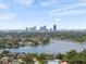 Aerial shot of the waterways, houses, and the city skyline in the distance at 454 35Th Ne Ave, St Petersburg, FL 33704