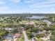 Aerial view of a neighborhood featuring a golf course and city view at 454 35Th Ne Ave, St Petersburg, FL 33704
