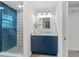 Updated bathroom featuring a tiled shower, sleek vanity, and contemporary fixtures for a modern aesthetic at 454 35Th Ne Ave, St Petersburg, FL 33704