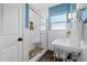 Stylish bathroom featuring a walk-in shower with pebble flooring and modern fixtures at 454 35Th Ne Ave, St Petersburg, FL 33704