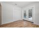 Bedroom with french doors leading to the pool area and a large closet at 454 35Th Ne Ave, St Petersburg, FL 33704