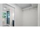 Walk-in closet offering ample storage space with built-in shelving and rods for organized clothing storage at 454 35Th Ne Ave, St Petersburg, FL 33704