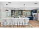 Stylish kitchen with a large island, navy cabinets, and counter seating, perfect for entertaining at 454 35Th Ne Ave, St Petersburg, FL 33704