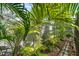 Beautiful tropical landscaping creates a private oasis around the property's perimeter at 454 35Th Ne Ave, St Petersburg, FL 33704