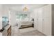 Bright bedroom featuring ample closet space, a comfortable bed, and a peaceful ambiance at 4616 S Matanzas Ave, Tampa, FL 33611