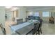Open dining room has access to the living room, front door, and views into the open kitchen at 4725 Soapstone Dr, Tampa, FL 33615