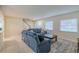 Bright living room with tile flooring, comfortable seating and lots of natural light at 4725 Soapstone Dr, Tampa, FL 33615