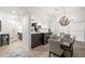 Elegant dining area next to the kitchen with a stylish table and chairs and modern decor at 6330 99Th N Way # 14B, Seminole, FL 33708