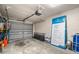 Attached garage with open door and door-opener ready for parking and storage at 6330 99Th N Way # 14B, Seminole, FL 33708