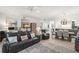The large living room flows seamlessly into the dining area, creating an open and inviting space at 6330 99Th N Way # 14B, Seminole, FL 33708