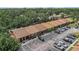 Aerial view of community, showing the layout and surrounding trees at 6346 Bonnie Bay N Cir, Pinellas Park, FL 33781