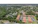 Aerial view of a cozy apartment community with mature trees in a convenient location at 6346 Bonnie Bay N Cir, Pinellas Park, FL 33781