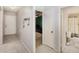 Clean hallway provides access to bedrooms and a full guest bathroom at 6346 Bonnie Bay N Cir, Pinellas Park, FL 33781