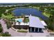 A pool and clubhouse with waterfront views and meticulously maintained grounds offering ideal relaxation and a sense of community at 6932 Old Benton Dr, Apollo Beach, FL 33572