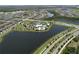 Aerial view of community amenities including pool, tennis courts, and walking trails at 6932 Old Benton Dr, Apollo Beach, FL 33572