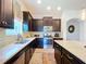 Well-equipped kitchen with stainless steel appliances and ample counter space at 6932 Old Benton Dr, Apollo Beach, FL 33572
