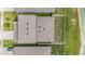Aerial view of the house showing the roof and surrounding neighborhood at 8576 Broadstone Dr, Wesley Chapel, FL 33544