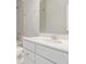 Bathroom featuring a single sink, light quartz countertops, and recessed lighting at 8576 Broadstone Dr, Wesley Chapel, FL 33544