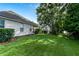 Spacious back yard with a screened porch offering serene outdoor living in a picturesque, quiet setting at 9608 Greenpointe Dr, Tampa, FL 33626