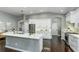 Modern kitchen featuring an island, stainless appliances, and an open design at 9608 Greenpointe Dr, Tampa, FL 33626