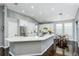 Large kitchen has stainless steel appliances, stylish backsplash, and vaulted ceilings at 9608 Greenpointe Dr, Tampa, FL 33626
