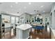 Spacious living area features a large island, modern fixtures, and an open floor plan at 9608 Greenpointe Dr, Tampa, FL 33626