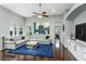 Cozy living room with hardwood floors, recessed lights, and a spacious, open feel at 9608 Greenpointe Dr, Tampa, FL 33626