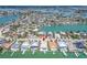 An aerial view shows the property's ideal location, surrounded by beautiful waterfront homes at 10126 Tarpon Dr, Treasure Island, FL 33706