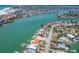 Aerial view of waterfront lot with easy access to beach and intracoastal waters at 10126 Tarpon Dr, Treasure Island, FL 33706