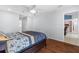 Spacious main bedroom featuring wood floors and en suite bathroom at 10446 Baylor Dr, Spring Hill, FL 34608
