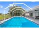Enclosed pool offers a private retreat, perfect for relaxation and outdoor gatherings at 10446 Baylor Dr, Spring Hill, FL 34608