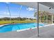 Bask in the sun by the sparkling pool in a screened-in enclosure, offering both fun and relaxation at 10446 Baylor Dr, Spring Hill, FL 34608