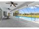 Enjoy outdoor living with this screened-in pool area, perfect for entertaining or unwinding in privacy at 10446 Baylor Dr, Spring Hill, FL 34608