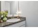 Bathroom vanity with granite countertop and silver faucet at 10512 Scenic Hollow Dr, Riverview, FL 33578