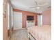 Bright bedroom featuring pink walls, carpet, and windows with lots of natural light at 10512 Scenic Hollow Dr, Riverview, FL 33578
