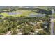An aerial view shows land with lakes and greenery at 12412 Lakeview Dr, Dade City, FL 33525