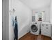 Bright laundry room with washer and dryer at 12412 Lakeview Dr, Dade City, FL 33525