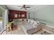Spacious living room featuring hardwood floors, and a comfortable sectional sofa at 12412 Lakeview Dr, Dade City, FL 33525