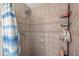 Tiled shower stall with modern fixtures at 12412 Lakeview Dr, Dade City, FL 33525