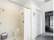 Walk-in shower with tiled walls, bench, and dual showerheads at 1332 Osceola Hollow Rd, Odessa, FL 33556